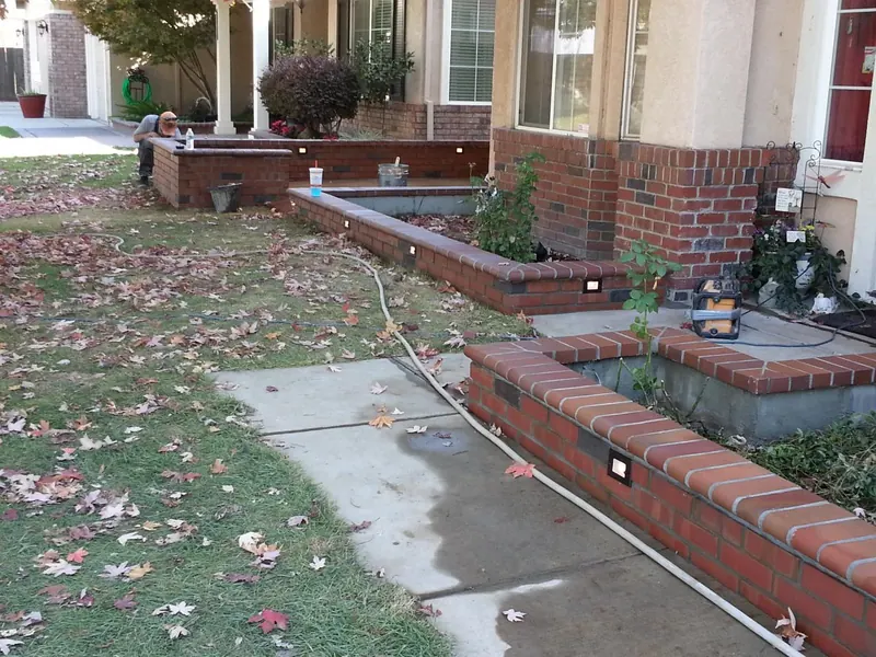 Brick planters with lights by Brickhouse Masonry, Central Valley CA