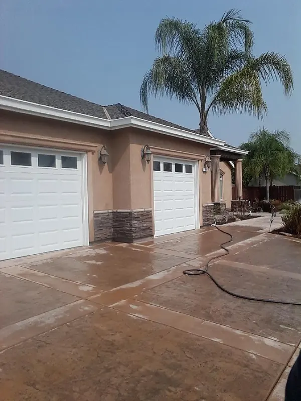 Colored concrete driveway by Brickhouse Masonry, Central Valley CA