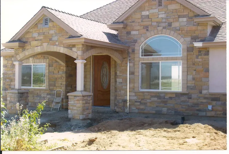 Cut stone home exterior by Brickhouse Masonry, Central Valley CA