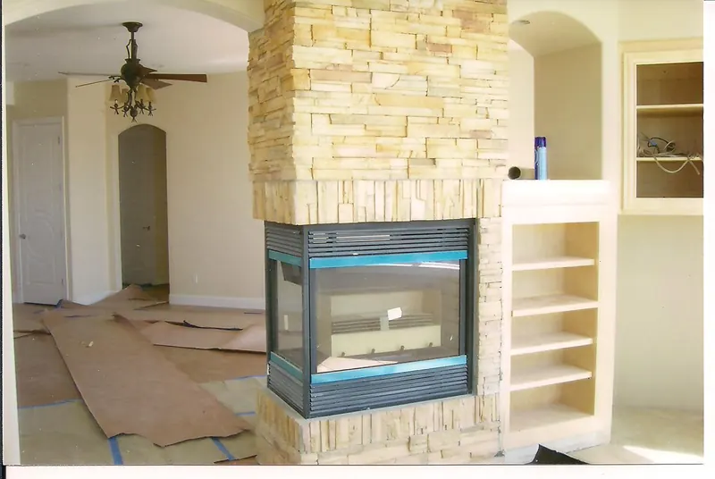 See-through stone fireplace by Brickhouse Masonry, Central Valley CA