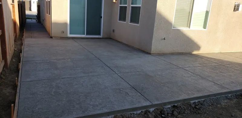 Side yard concrete patio by Brickhouse Masonry, Central Valley CA