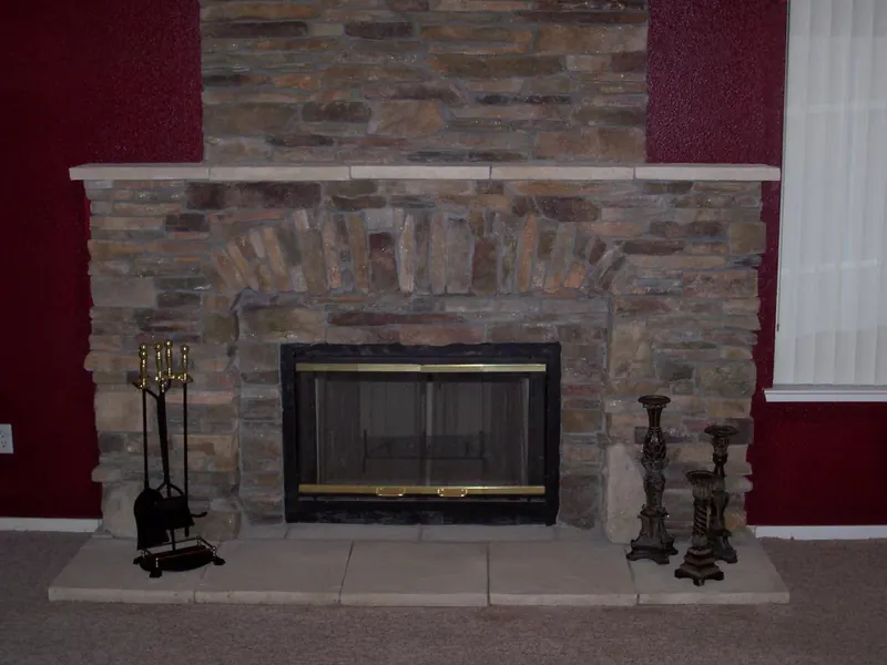 Stone fireplace with hearth by Brickhouse Masonry, Central Valley CA