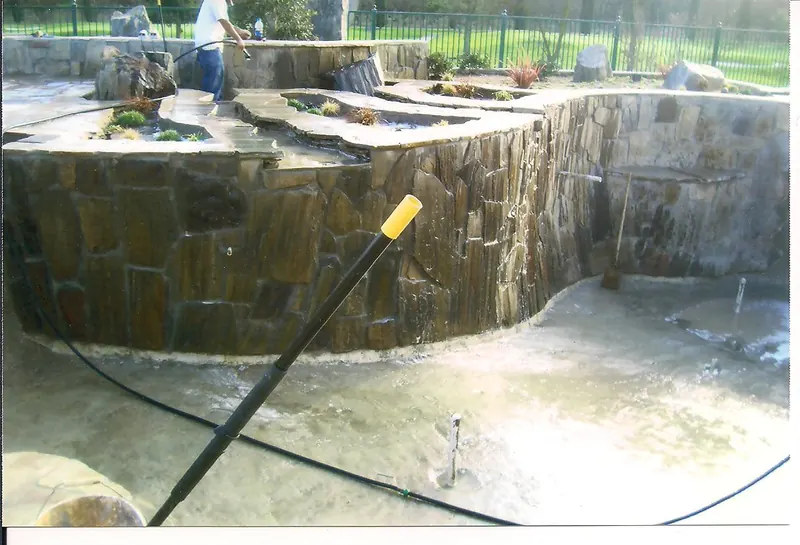 Stone pool wall by Brickhouse Masonry, Central Valley CA