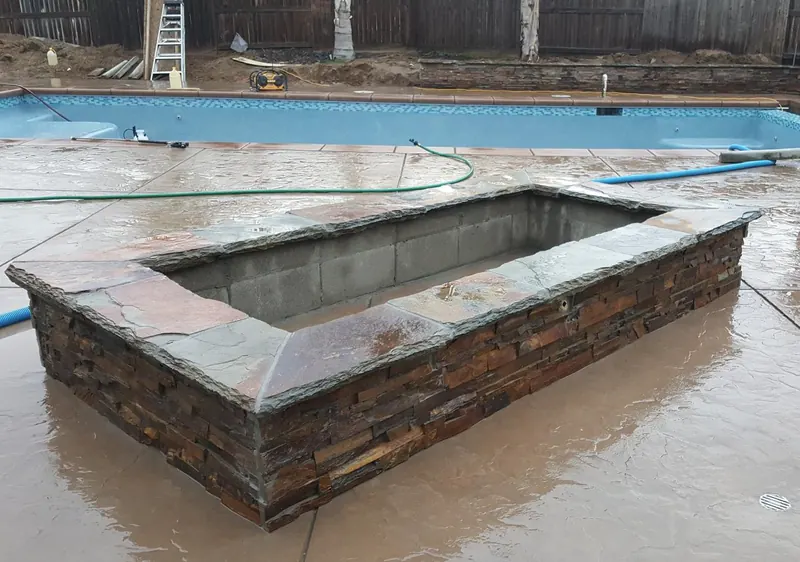 Stone spa surround by Brickhouse Masonry, Central Valley CA