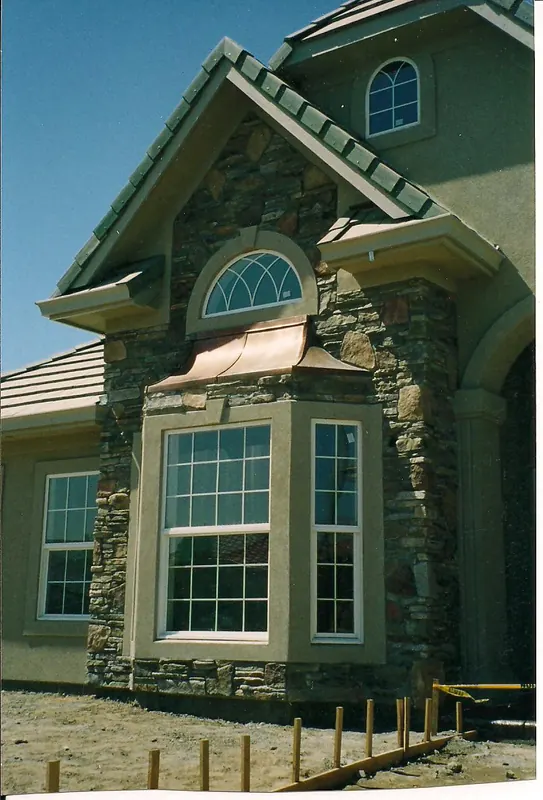 Stone tower and bay window by Brickhouse Masonry, Central Valley CA