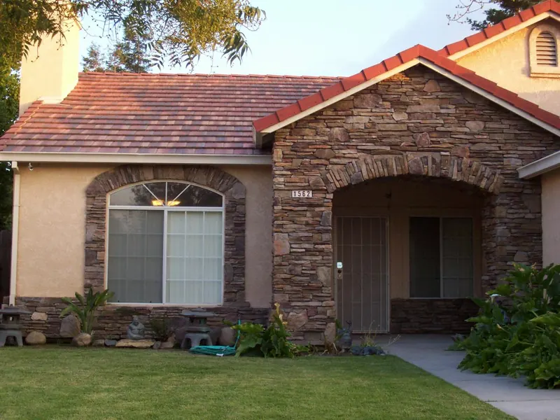 Stone veneer front elevation by Brickhouse Masonry, Central Valley CA